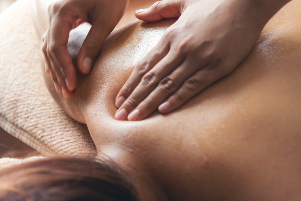 woman receiving massage therapy in north vancouver